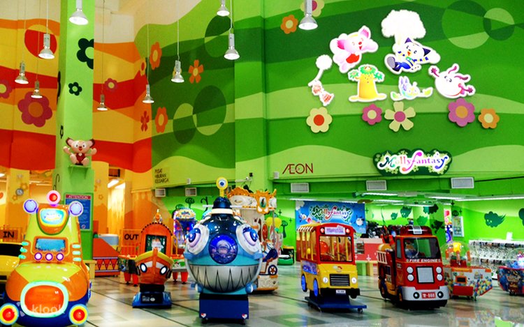 Colourful kiddie rides and arcade machines at an indoor children's games centre