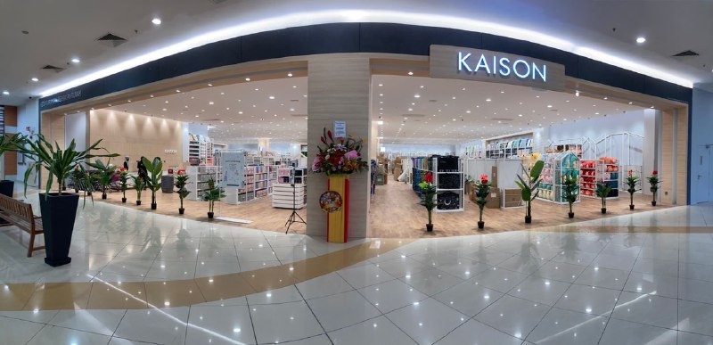 The bright, plant-filled Kaison home and lifestyle storefront with a grand-opening flower stand
