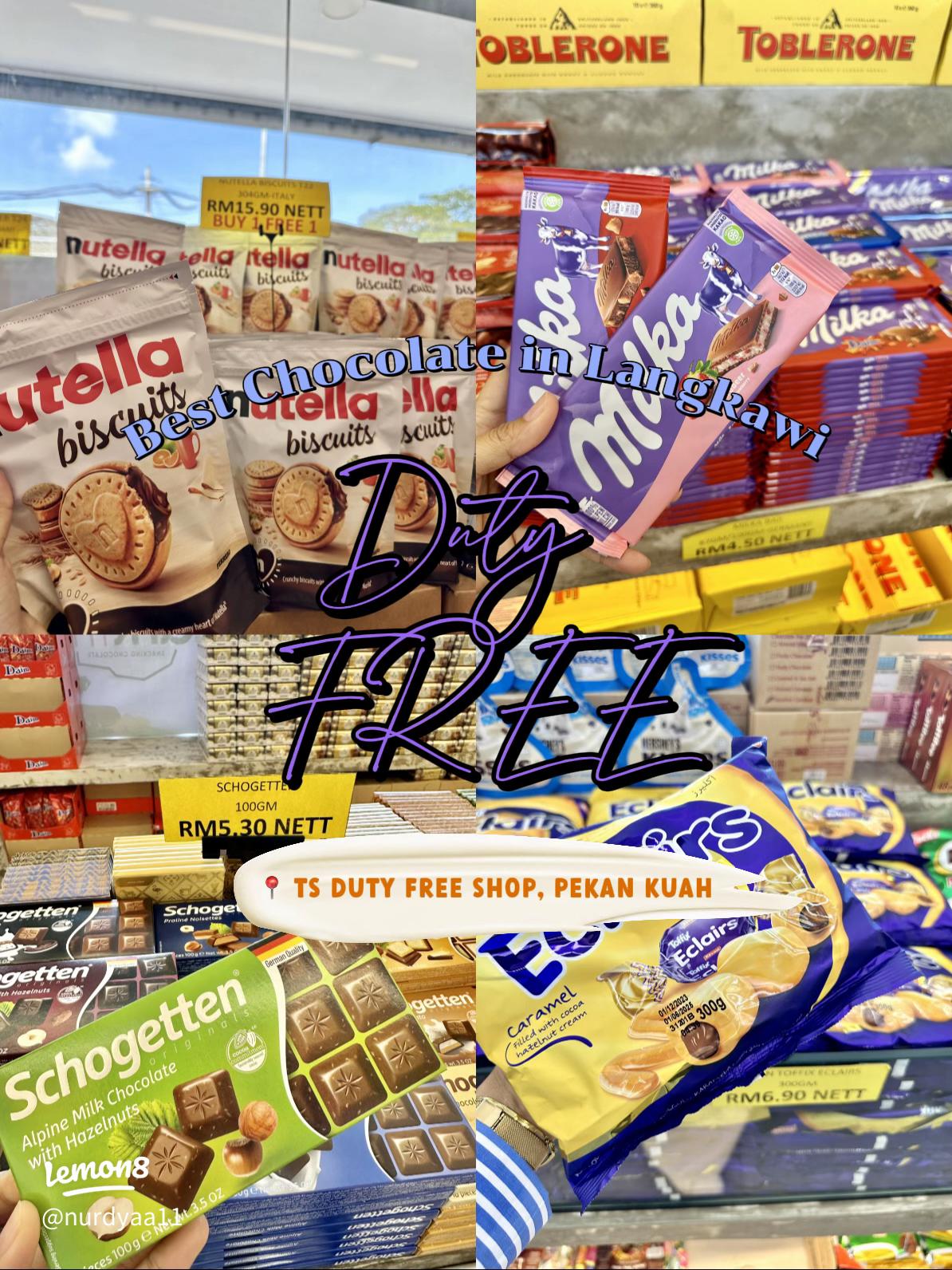 Shelves of duty-free chocolate brands like Milka and Toblerone at a Langkawi shop