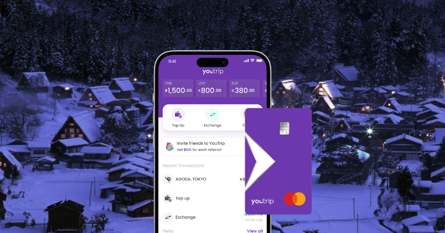 The YouTrip app and card showing multi-currency wallet balances over a snowy Shirakawago backdrop