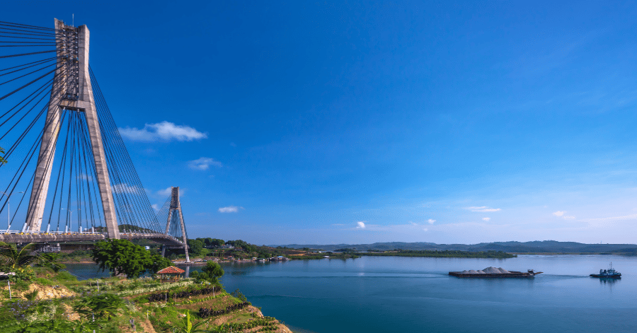 The cable-stayed Barelang Bridge spanning blue water in Batam