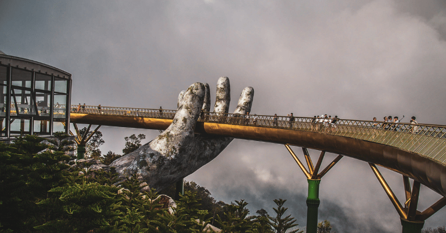 Da Nang's Golden Bridge held aloft by two giant stone hands above the clouds