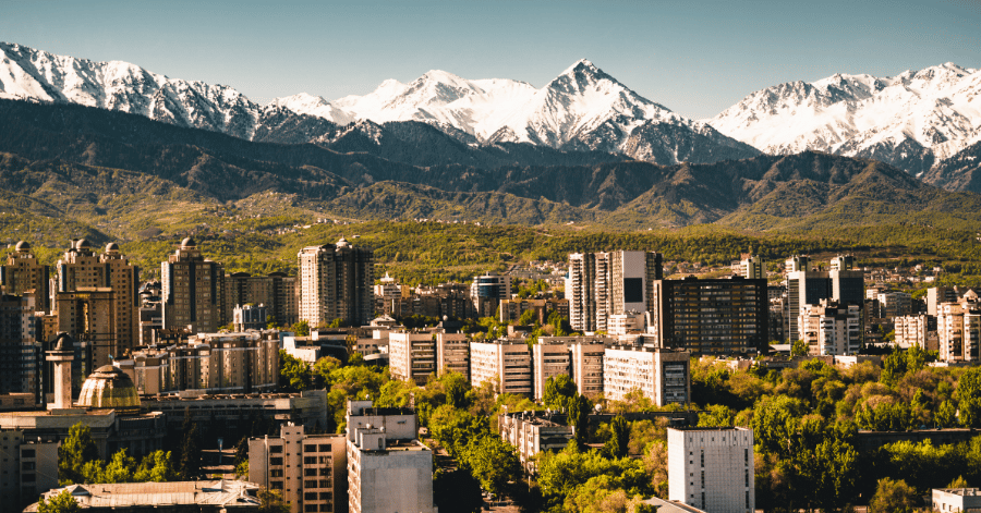 Almaty city skyline backed by the snow-capped Trans-Ili Alatau mountains