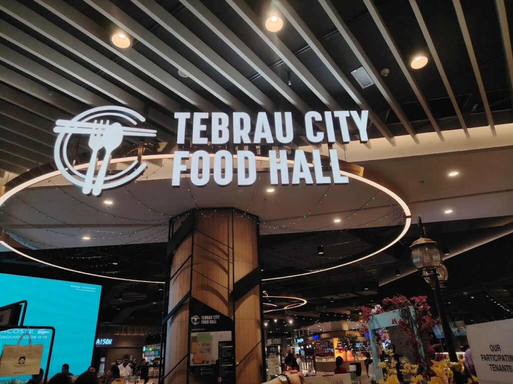 Illuminated Tebrau City Food Hall signage above the entrance to the food hall