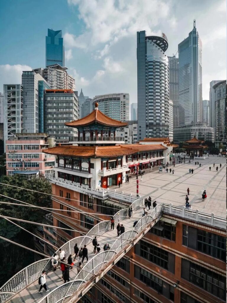 A rooftop pavilion and elevated walkway above the city at Kuixing, Chongqing