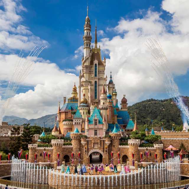 The Castle of Magical Dreams at Hong Kong Disneyland with fountains and fireworks