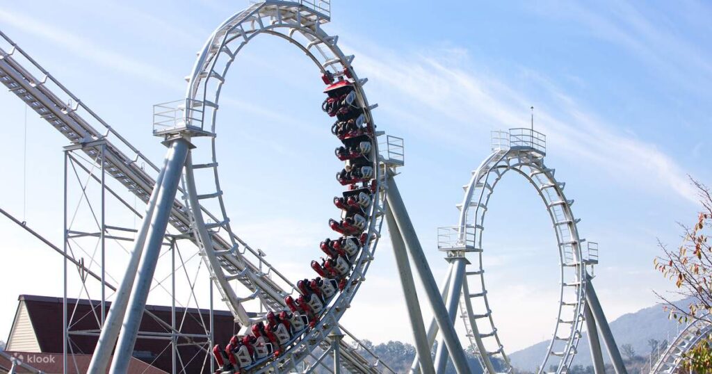Rolling X-Train carries riders upside down through the first of two vertical loops