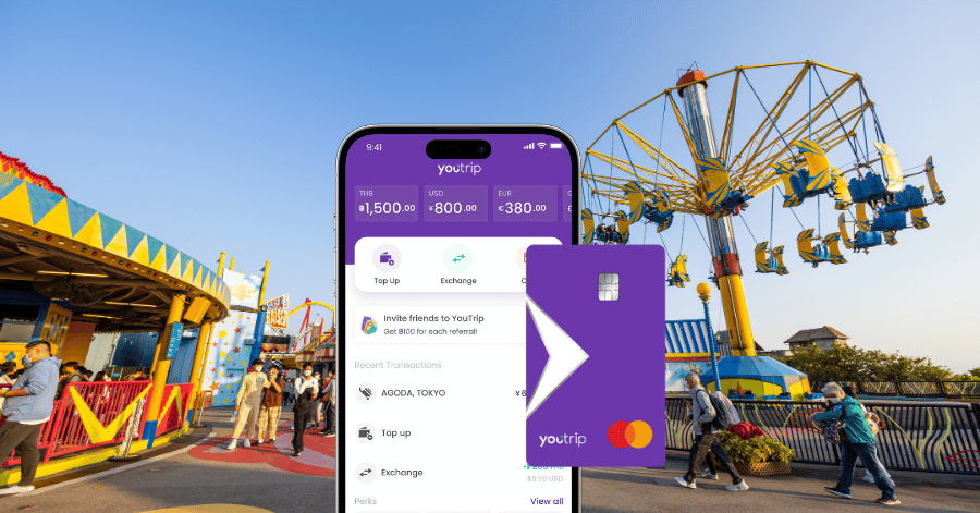 The YouTrip app and purple card shown against an Ocean Park swing-ride backdrop