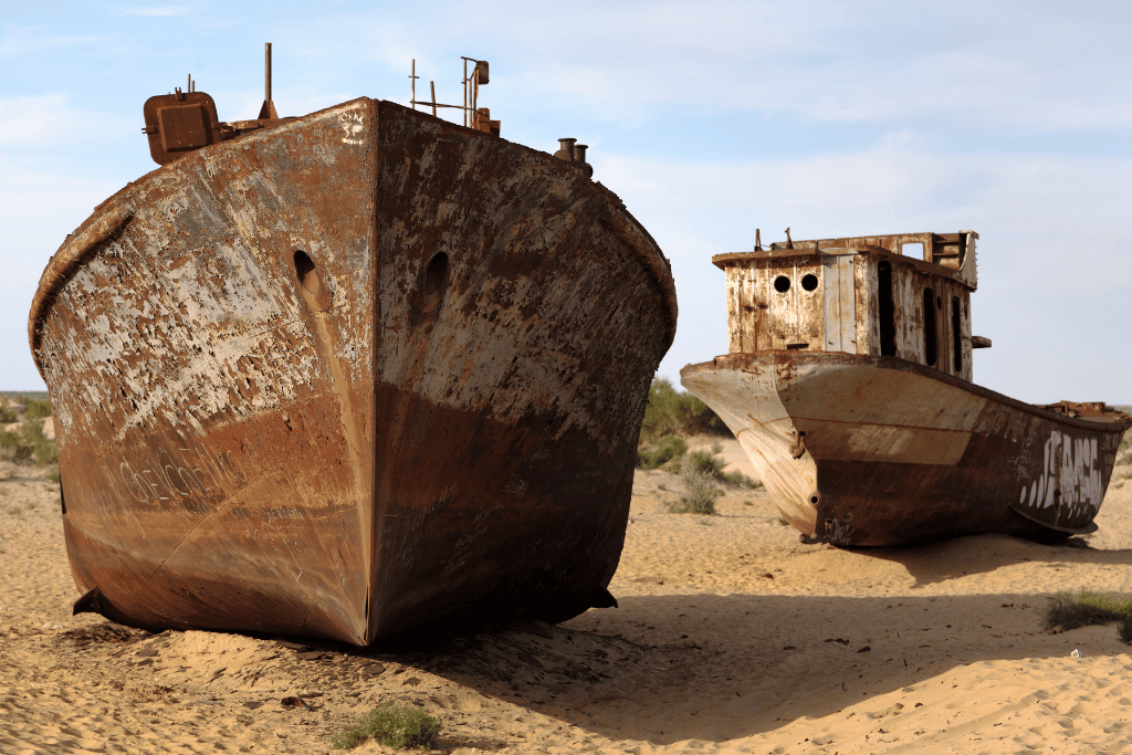 Rusted fishing boats stranded on dry seabed near Moynaq, the former Aral Sea