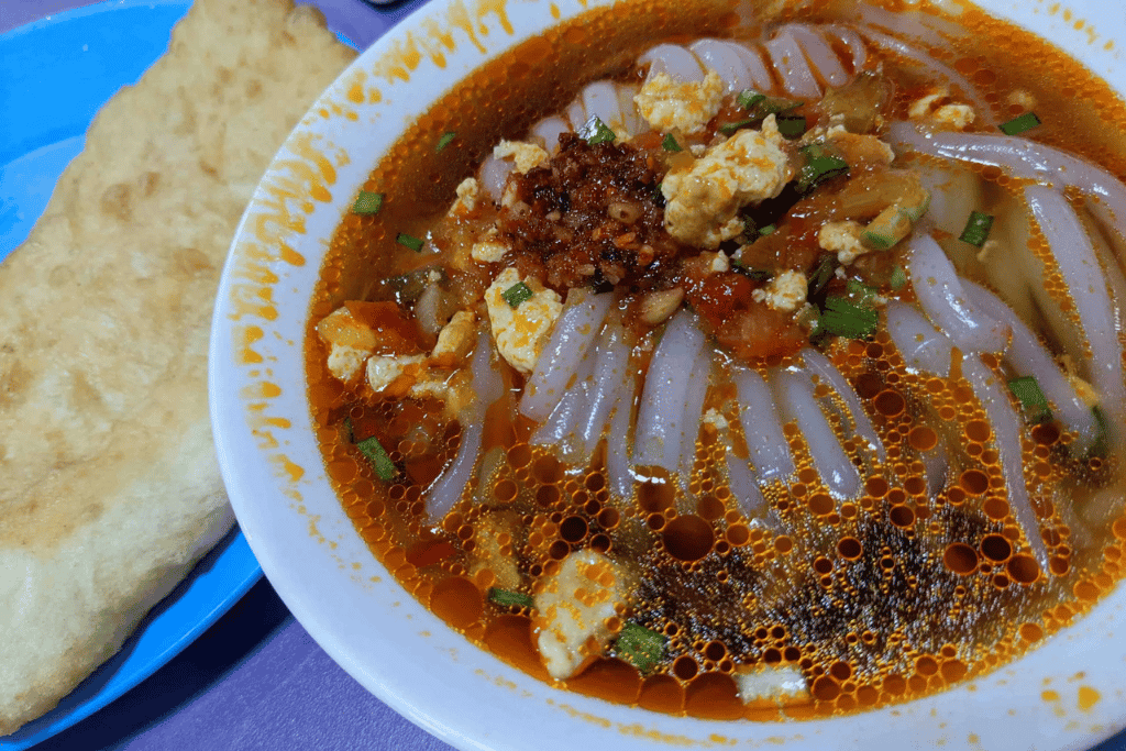 The Ashlan-Fu Saida food stall in Karakol's Bugu Bazaar, known for the city's best ashlan-fu