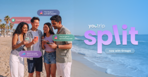Four friends on a beach receiving split bill request notifications through the YouTrip Split app