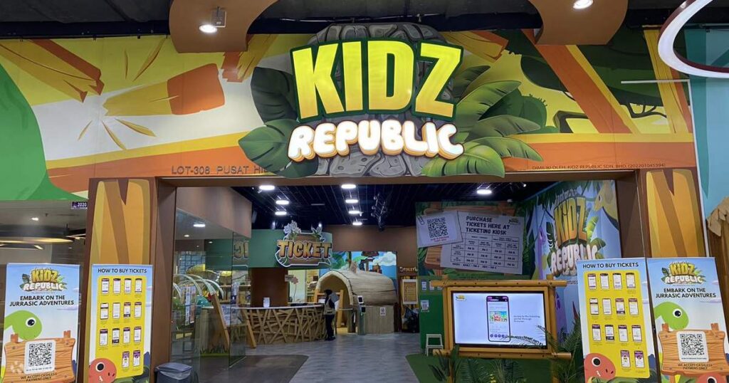 Kidz Republic Indoor Theme Park entrance at Komtar JBCC, with jungle-themed signage and a ticket kiosk