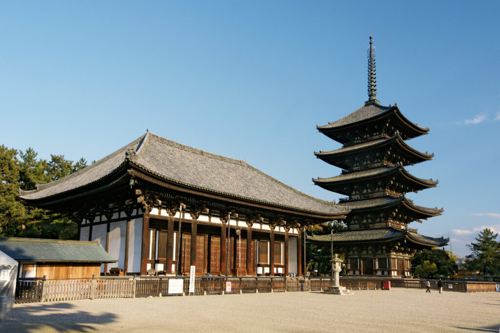 Kofuku-ji Temple's five-storey wooden pagoda beside its central hall in Nara