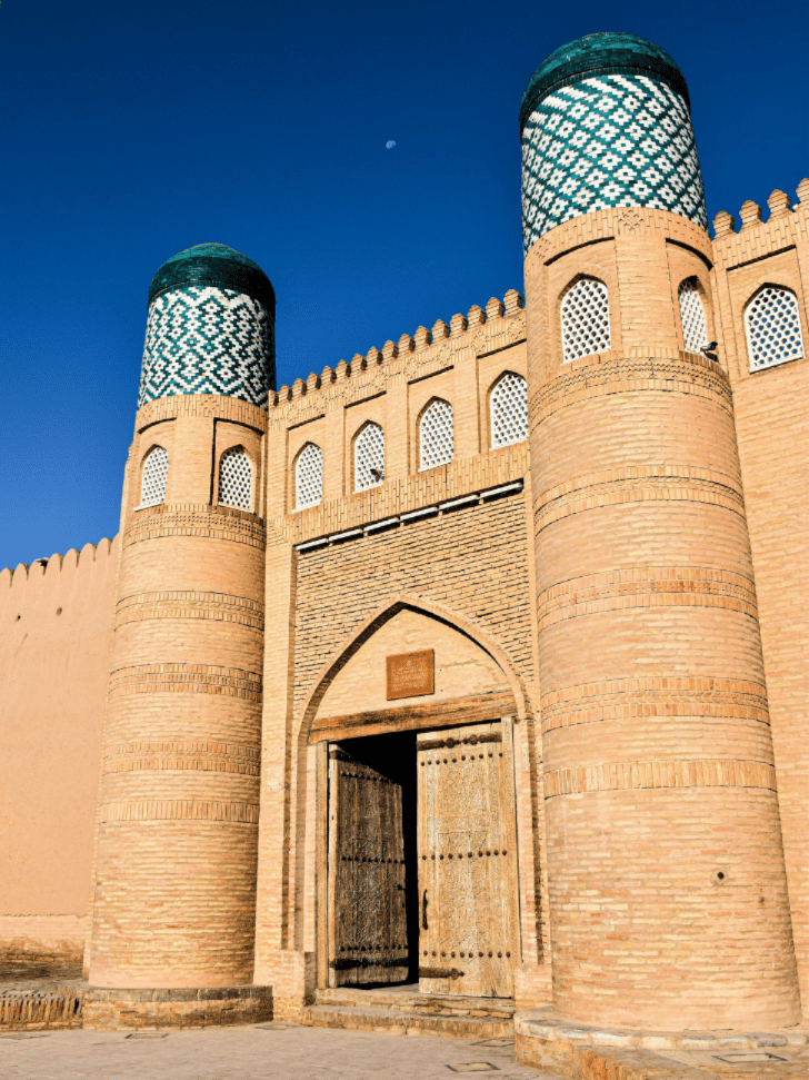 View over Khiva's walled town from the Kunya-Ark citadel at sunset