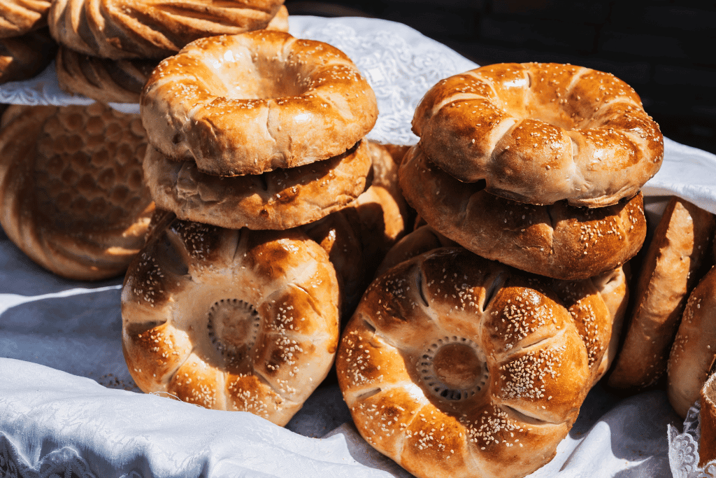 Round tandoor-baked non bread stamped with a decorative pattern
