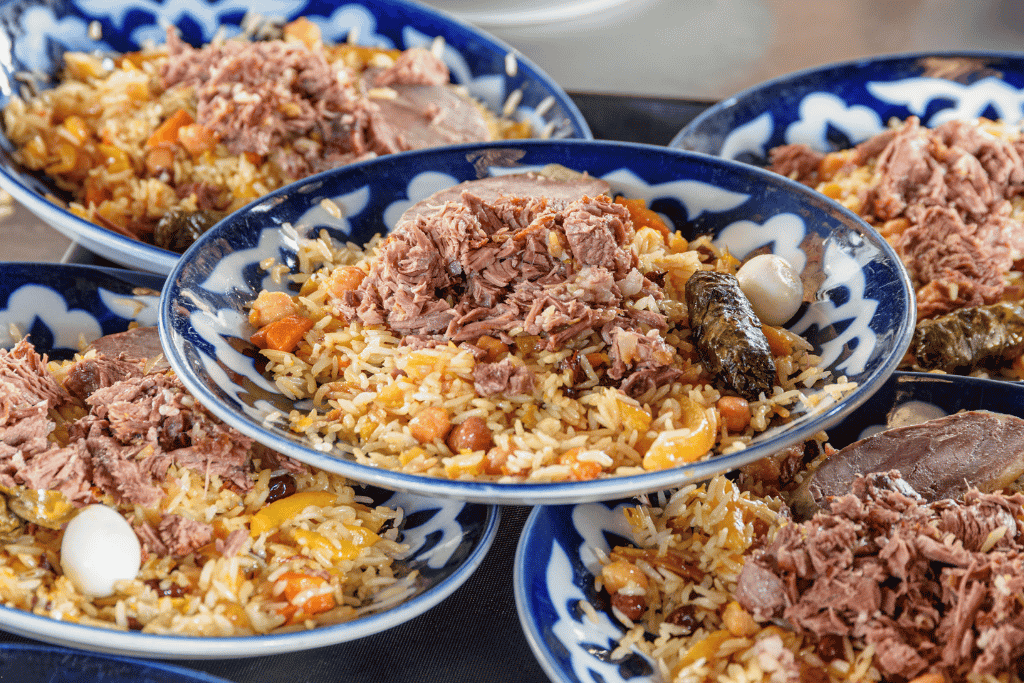 A plate of plov, rice cooked with carrots and lamb, Uzbekistan's national dish