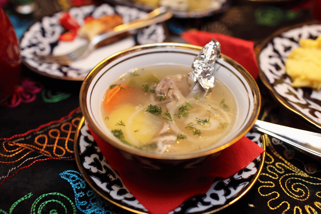 A bowl of shorpo, a rich meat and vegetable broth
