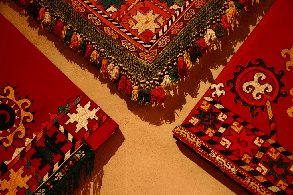 Hand-embroidered suzani textile in bold floral patterns