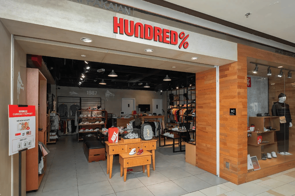Hundred% streetwear store entrance at Komtar JBCC, with sneakers and apparel on display