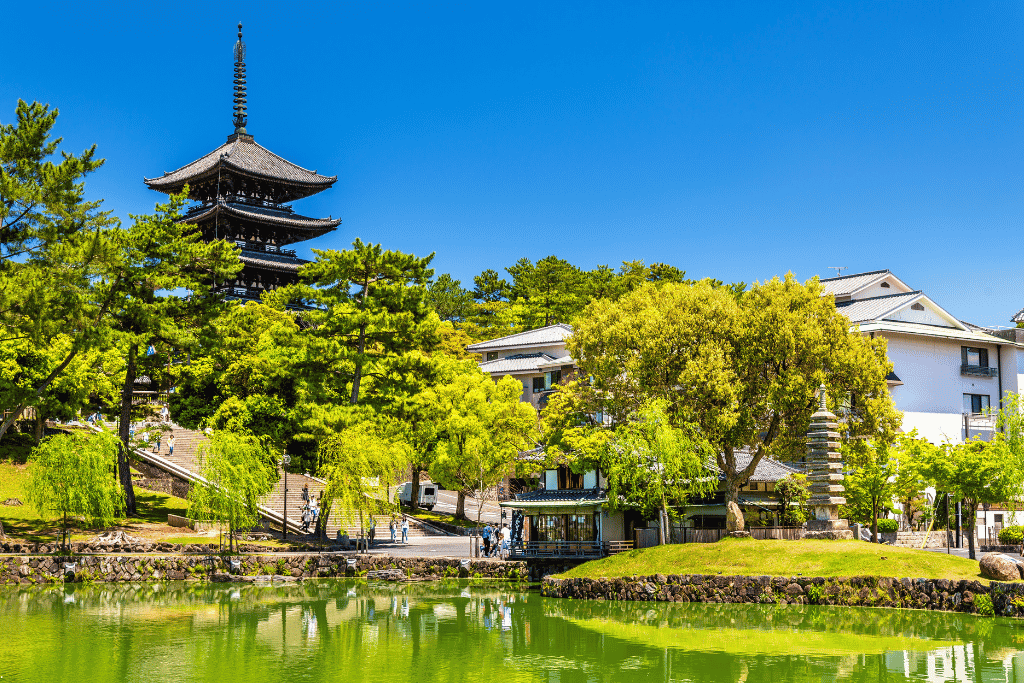Kofuku-ji Temple's pagoda reflected in the still water of Sarusawa Pond
