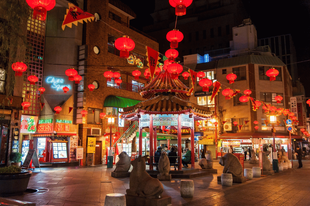 Nankinmachi's central pavilion strung with red lanterns at night
