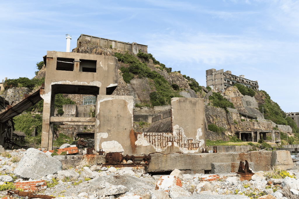 Crumbling concrete apartment ruins on Gunkanjima, Nagasaki's abandoned Battleship Island