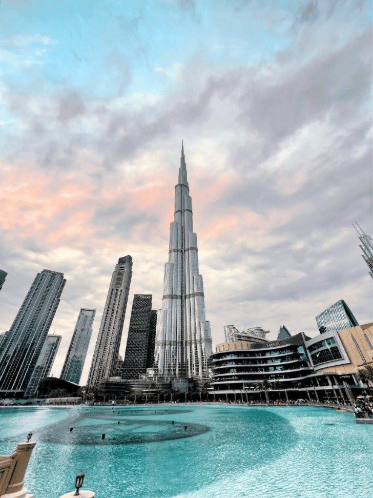 Burj Khalifa towering over the Dubai Fountain lake in Downtown Dubai