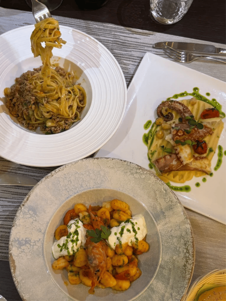 Duck ragout fettuccine and gnocchi plated at Il Cavatappi in Varenna