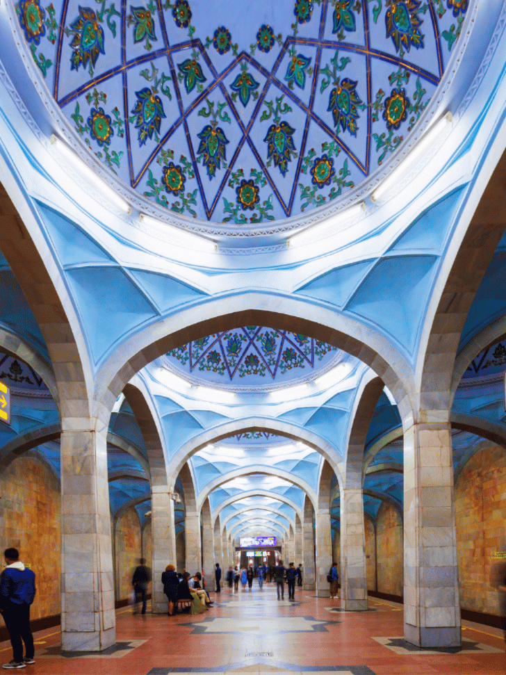 Ornate blue floral-patterned dome ceiling inside a Tashkent Metro station