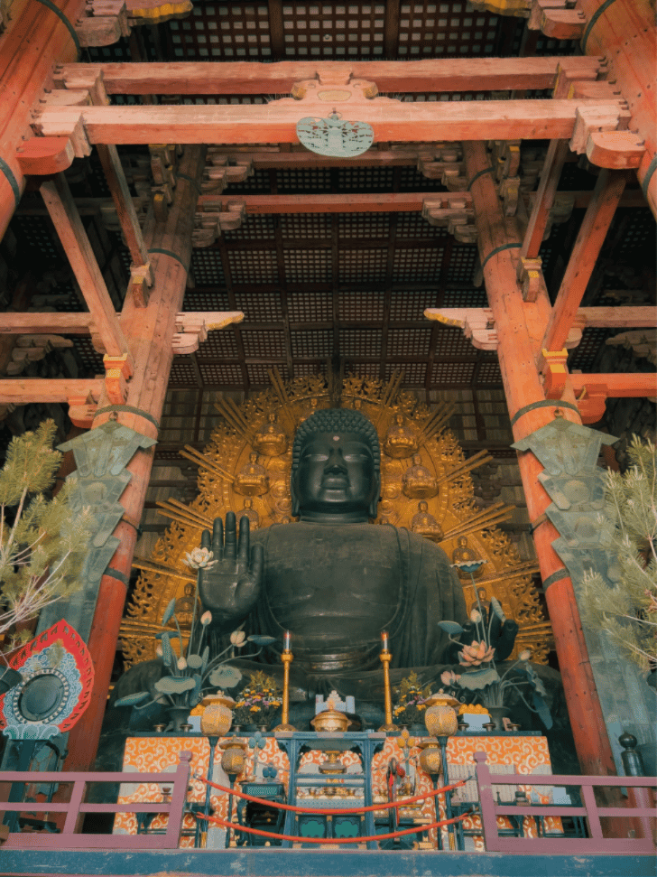 The bronze Great Buddha statue seated inside Todai-ji's Great Buddha Hall in Nara