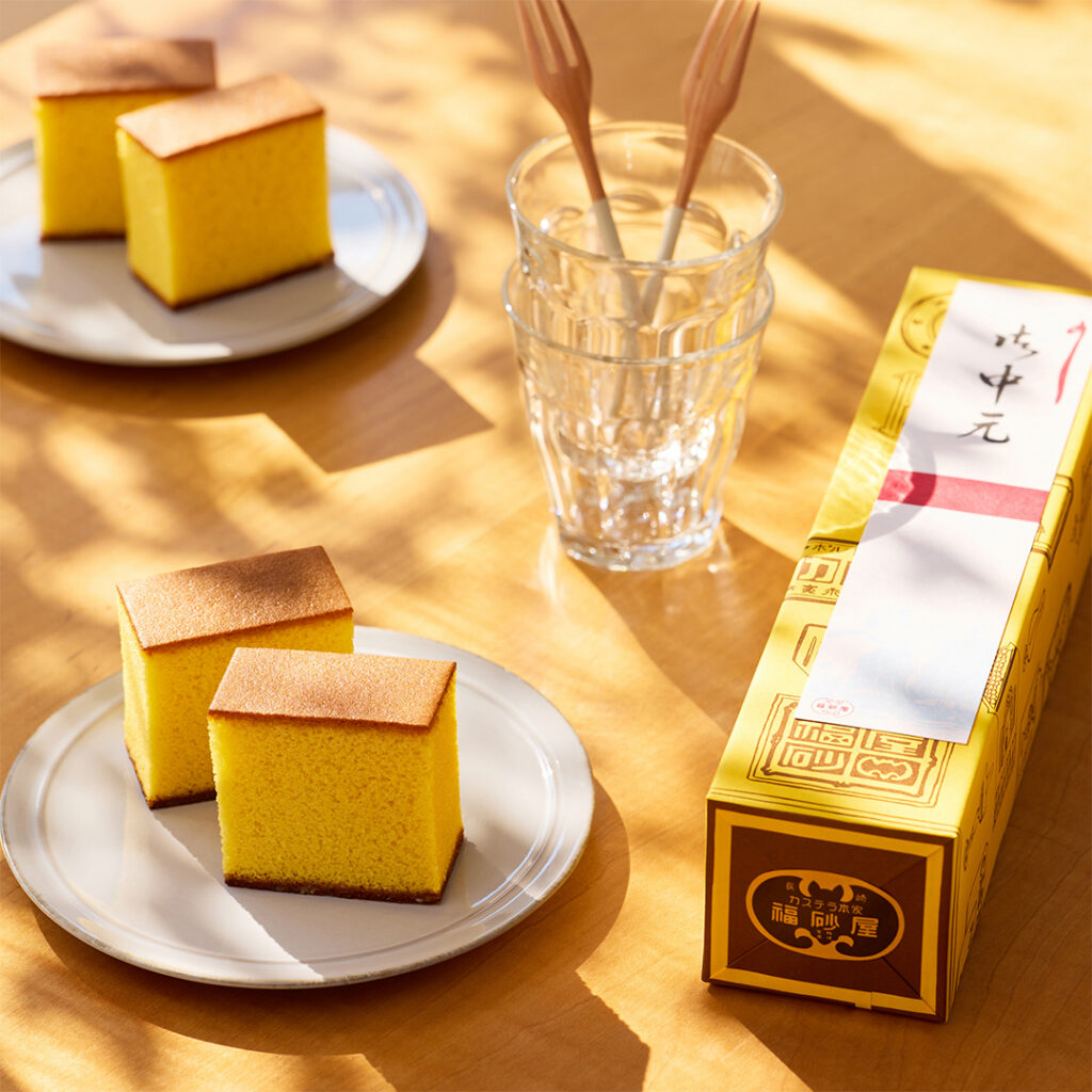 A sliced block of Fukusaya castella cake, one of Nagasaki's big three brands