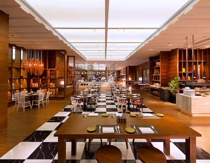 Makan Kitchen restaurant interior with checkered floor and buffet counters at DoubleTree by Hilton Johor Bahru