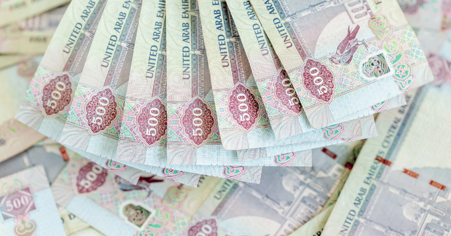 Fanned-out stack of 500 dirham banknotes