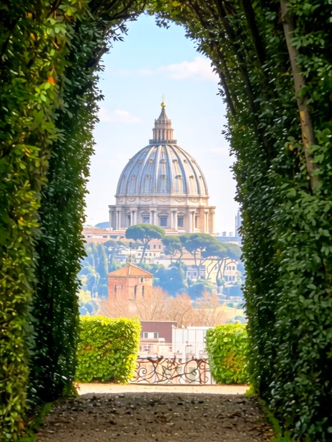 St Peter's dome framed through the Aventine Keyhole