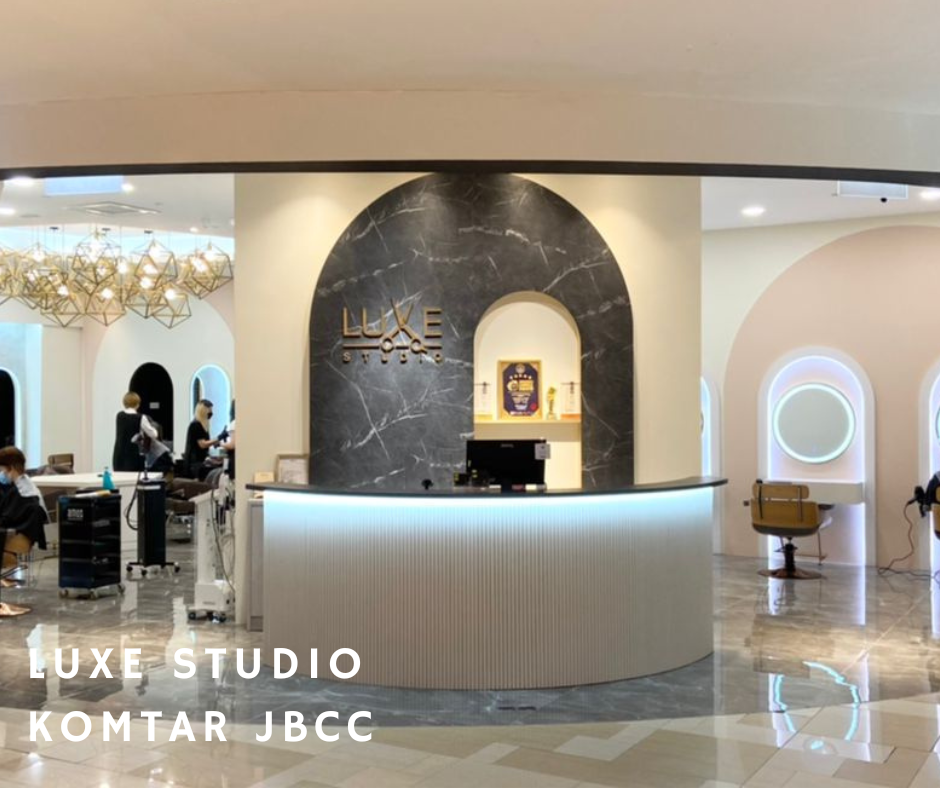 Luxe Studio's marble-arched reception desk at Komtar JBCC