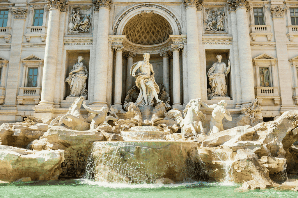 Trevi Fountain's carved sea gods and horses above the basin