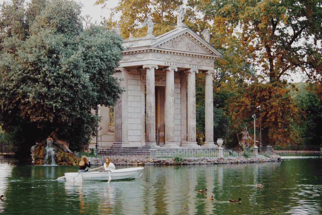 Shaded garden paths and greenery inside Villa Borghese