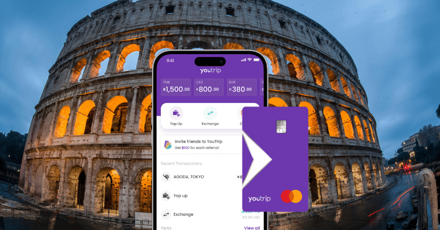 YouTrip app and card shown in front of the Colosseum at dusk