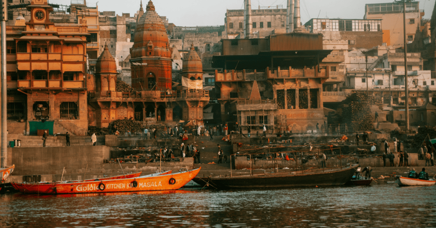 Boats moored along the riverside ghats of Varanasi on the Ganges